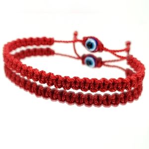 Fashionable and durable hand-made red string braided bracelet with an evil eye